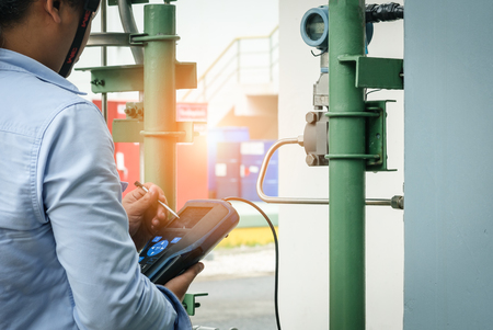 Technician,Instrument technician on the job calibrate or function check equipment in process industry.の写真素材