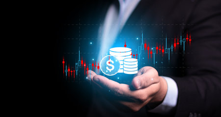 Trader holding growing stock on virtual screen for invest in trading. planning and strategy, Stock market, Business growth.の写真素材