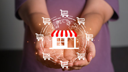 Franchise business concept, Franchise business or marketing expansion for growth. Businessman holding globe with franchise marketing system in global business network.の写真素材