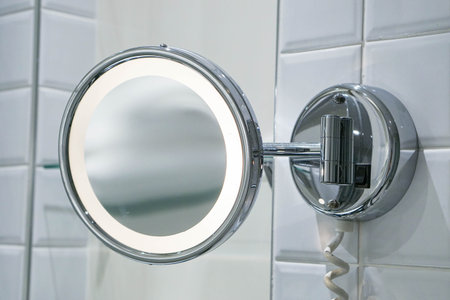 bright round mirror hang in the bathroomの写真素材