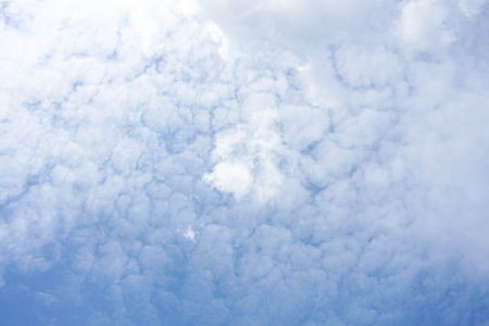 Puffy cloud with deep blue sky