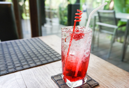glass of raspberry soda in the restaurantの写真素材