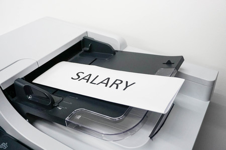 piece of paper for salary on the printerの写真素材