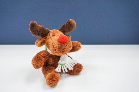 isolated reindeer toy on the tableの写真素材