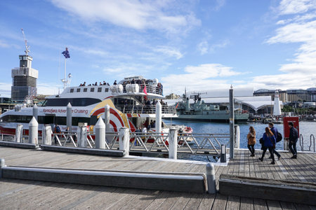 people on the boardwalk to enter the cruise at Darling Harbour taken in Sydney, Australia on 6 July 2016のeditorial素材