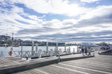 People are walking on the dock for cruise entrance in Darling Harbour taken in Sydney Australia on 6 July 2016のeditorial素材