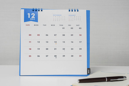 business concept of arranging December meeting on calendarの写真素材
