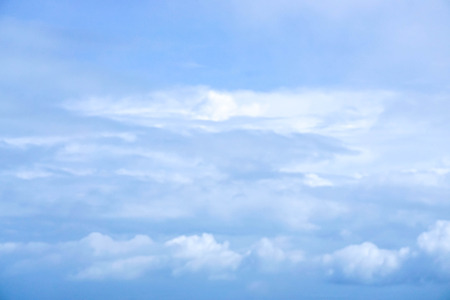 blue sky in the late afternoon with fluffy cloudの写真素材
