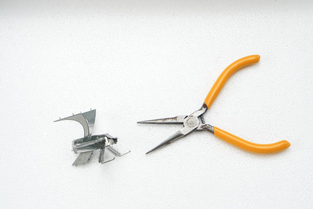 isolated pliers with steel modelの写真素材