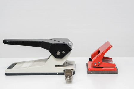 isolated close up  paper punch on tableの写真素材