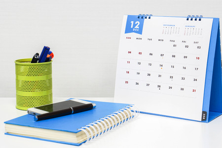 December calendar on office desk ready for appointment and business meetingの写真素材