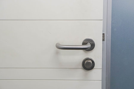 close up modern office doorknob