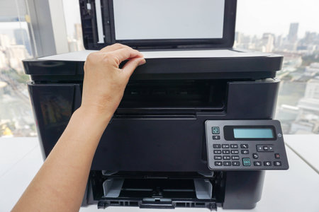 place white paper sheet on printer plate for business documenting scanning