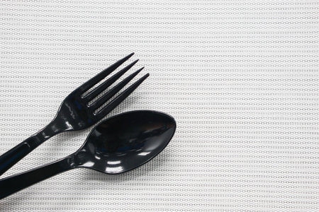 isolated spoon and fork pair for meal
