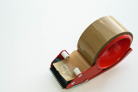 isolated brown adhesive tape for packing processの写真素材