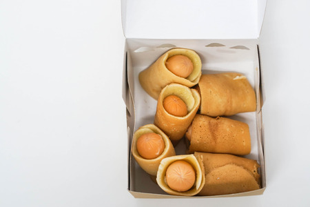 isolated pancake roll with sausageの写真素材
