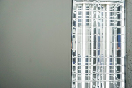 close up light bulb on office ceilingの写真素材