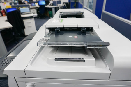 close up multifunction printer tray in office with selective focusの写真素材