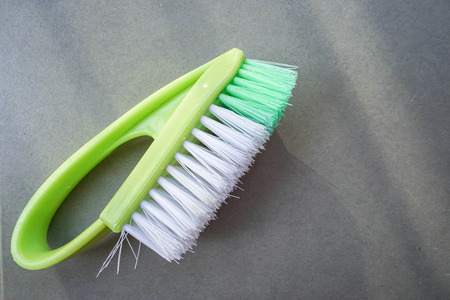 close up green washing brush on the floorの写真素材