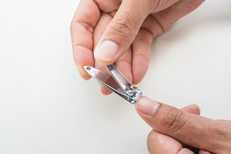 close up man use nail clipper for sanitaryの写真素材