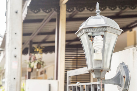 vintage lamp at the house door fenceの写真素材