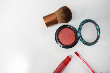 isolated cheek brush and pink brush on with red lip gloss for women beautyの写真素材