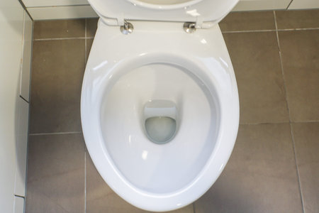 close up white ceramic toilet bowl