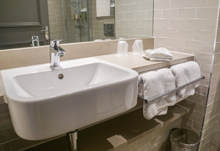 luxury wash ceramic basin and white towel in bathroom hotel