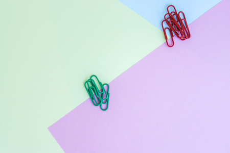 Mock up minimal background in pastel color with  red and green paper clipの写真素材