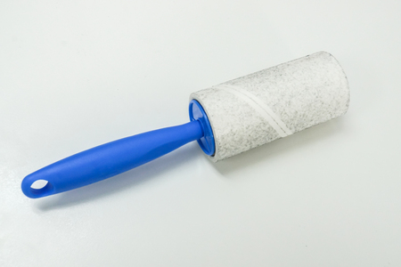 isolated lint roller for remove fur from clothesの写真素材