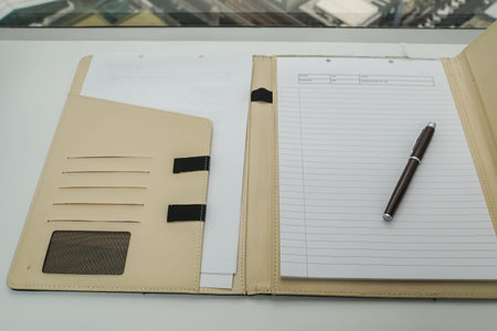 mock up notebook in leather case for memo and minute of meeting