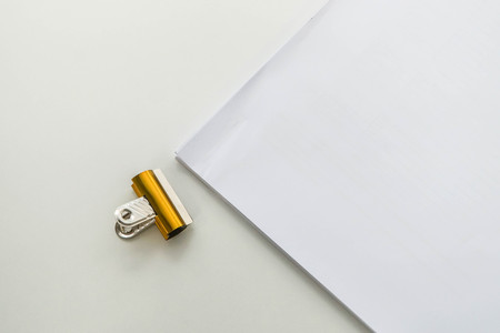 isolated paper clip for business document pilesの写真素材