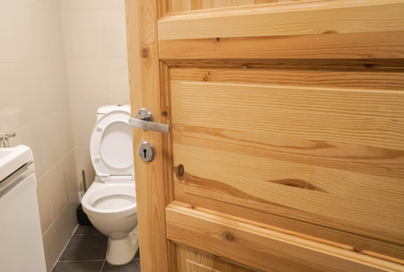 close up keep the toilet door open in hotel bathroomの写真素材