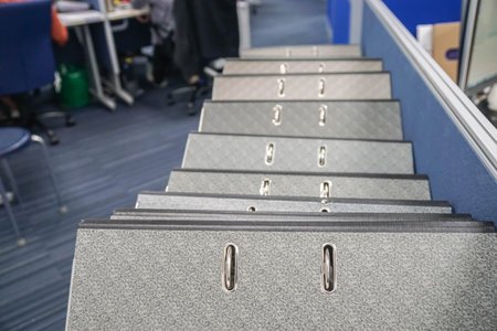 close up thick business folders on office desk for record and review