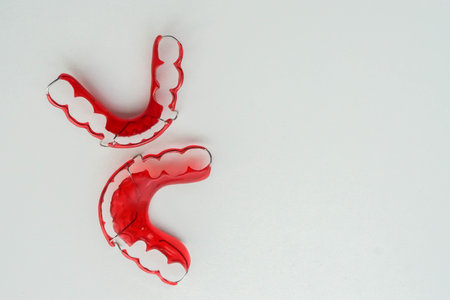 top view of isolated red retainer for women