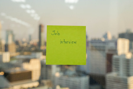 sticker note with job interview message for reminderの写真素材