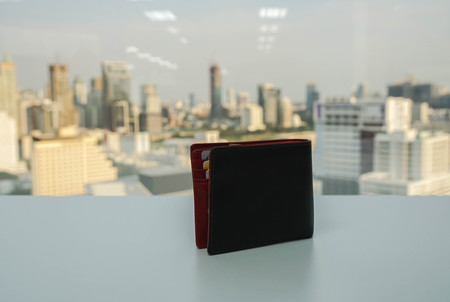 Brown man wallet with credit card on office desk for bill paymentの写真素材