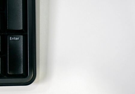 isolated enter button on computer keyboardの写真素材