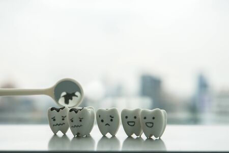 isolated human oral health concept to check the decay teeth by dentist every 6 monthsの写真素材