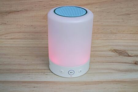 modern glowing bluetooth portable speaker with control button for musicの写真素材