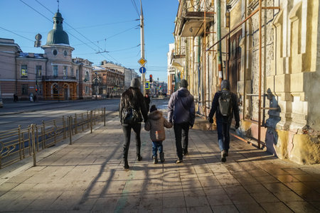 Irkutsk / Russia - 17 February 2019: family and local people walk on street footpath in the morning holidaysのeditorial素材