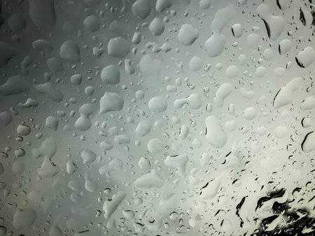 abstract water drops on the glass in rainy day season