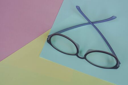 cute violet women eyeglasses for blue light protection on pastel backgroundの写真素材