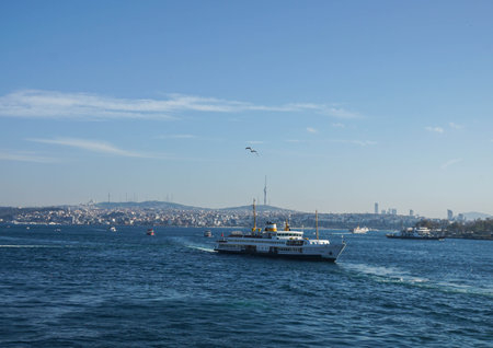 Istanbul / Turkey - December 9 2019: luxury cruise and passenger boat tour in Bosphorus Black Sea in blue sky sunny day in winterのeditorial素材