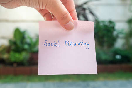 people health concept of covid-19 prevention by social distancingの写真素材
