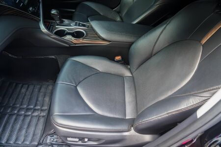 close up leather passenger seat in the luxury carの写真素材