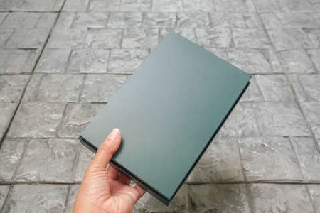 close up woman give green gift box for birthday and wedding anniversaryの写真素材