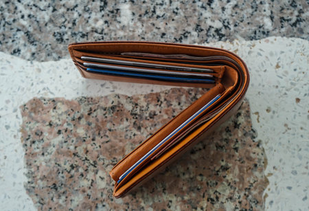 brown men leather wallet with cash and credit card for online shopping