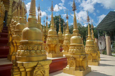 close up golden pagoda in rural temple for Buddhist worshipのeditorial素材