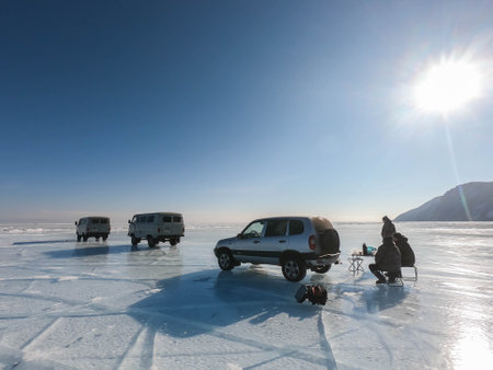 Irkutsk / Russia - February 14 2019: UAZ vintage Russian van on thick frozen Baikal lake in winterのeditorial素材